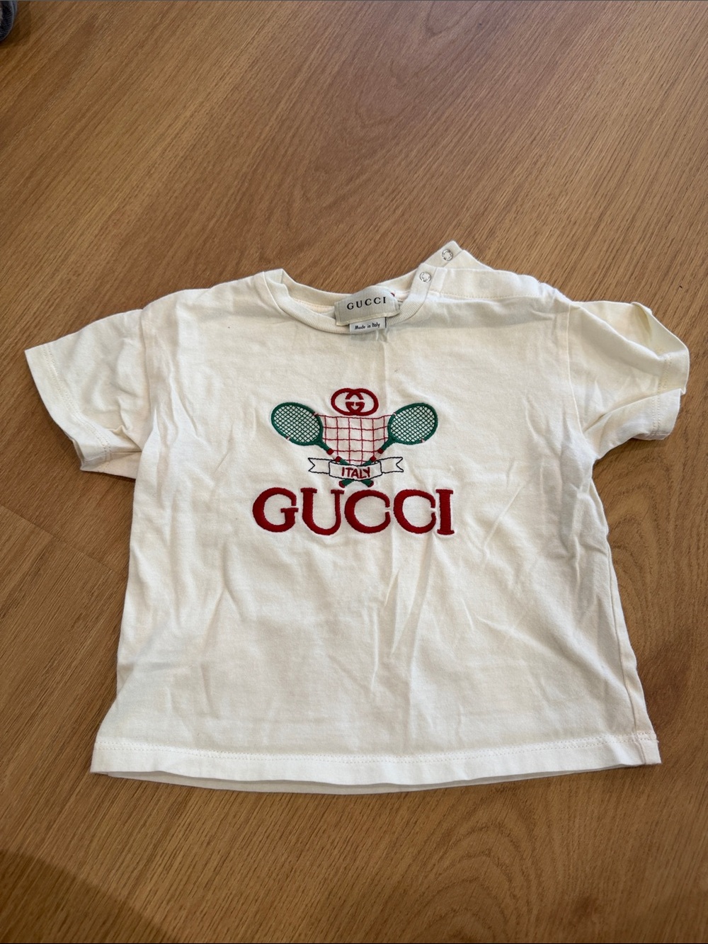 Gucci White Kids Tee with Red Logo and Green Tennis Motif